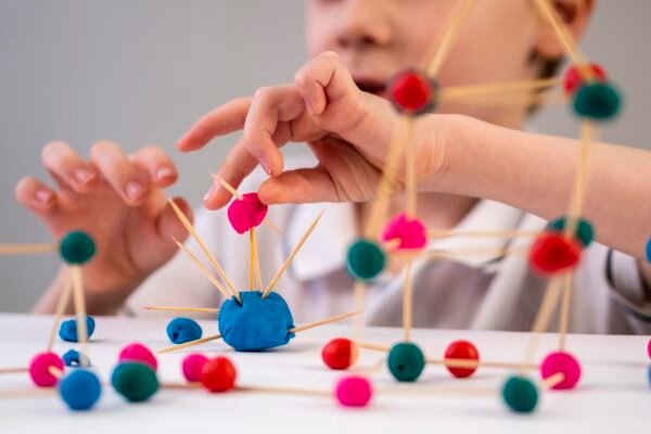 boy-playing-with-chemistry-game