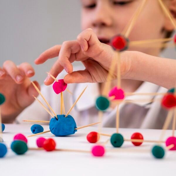 boy-playing-with-chemistry-game