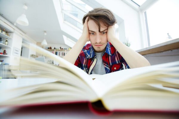 Serious student preparing for exam or seminar