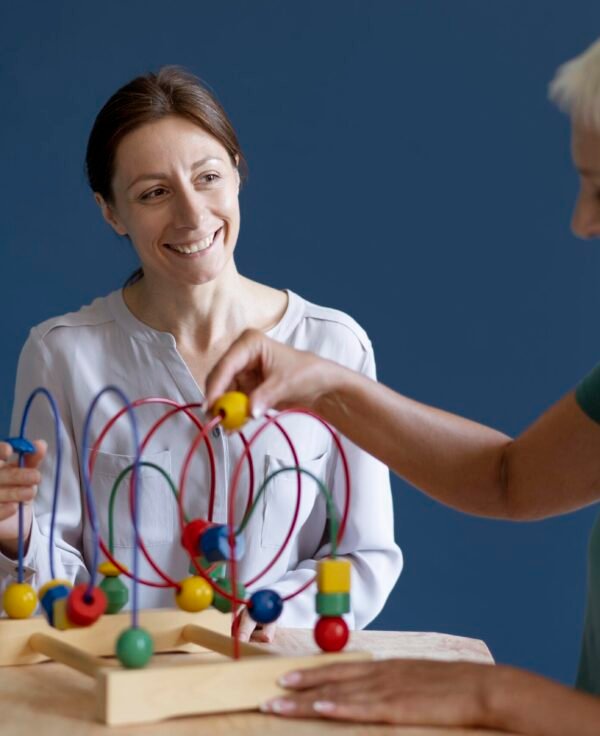 woman-doing-occupational-therapy-session-with-psychologist